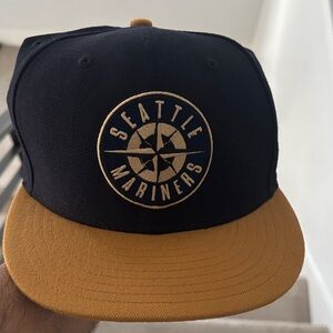 New Era Black and Gold Seattle Mariners SnapBack hat